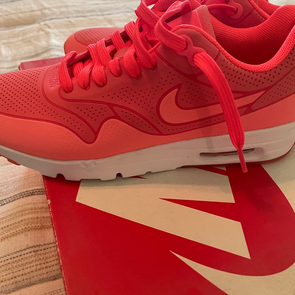Nike Women's Sneakers in Bright Coral and White
